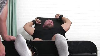 BDSM session leaves bearded hunk helpless from foot tickling