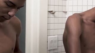 Twink twins Dante and Diego stroke cocks together in bathroom