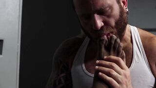 Riley tends Damien Rouxs achy black feet and foot fucks shaft