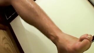 Jay Marx works his big dick while showing off his toes