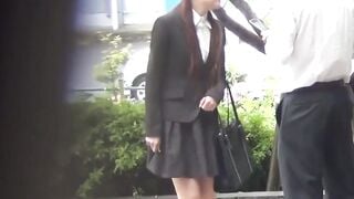 Japanese woman releases urine from slit while skirt stays on