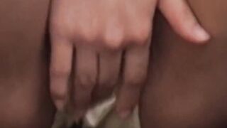 Rain wont stop Asian cutie fingering twat outdoors