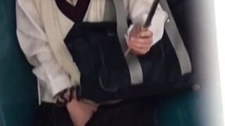 Rain wont stop Asian cutie fingering twat outdoors
