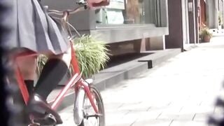 Sweaty Japanese schoolgirl rides bike and soaks seat with her juice