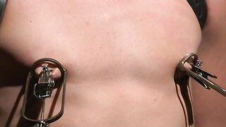Bondage slut Dakota Wolfe takes on rough anal and clamp torment