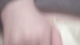 Hot Asian babe fingers herself while teasing big soft boobs