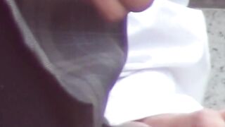 Japanese teens sit on steps and show damp pink panties to the camera