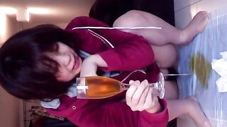 Japanese vixen pees repeatedly to top off her container