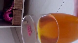 Japanese vixen pees repeatedly to top off her container