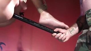 MuscleJockBound.com - Master Ricky Saint inserts baton into sub's tight muscle hole
