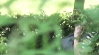 Voyeur films Asian women making puddles ina  public park