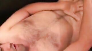Bald mature man jerks off while riding a thick dildo
