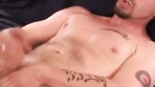 Mature man strokes cock with toy buried in his ass