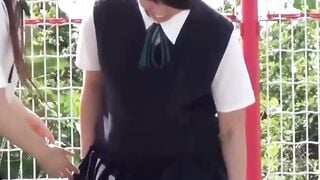 Japanese schoolgirl teens are teasing each other while peeing