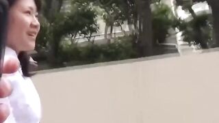 Adorable girl rushes to the park to find a spot to pee