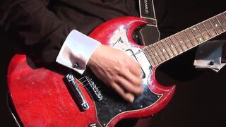 Slutty blonde into mini skirt blows the musician's cock after the performance