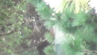 Naughty cutie pees through soaked clothes in a public spot