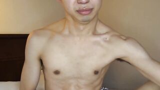 Handsome Asian twink jerks off moaning loudly