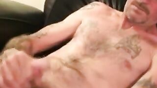 Tattooed mature amateur strokes small cock and blows load