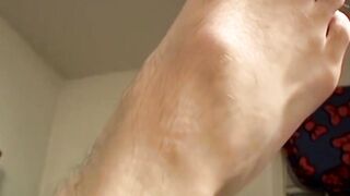Bad boy Nolin wanks his meaty cock while showing hairy feet