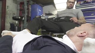 Mechanic dom wrestles hunk down for sweaty foot worship