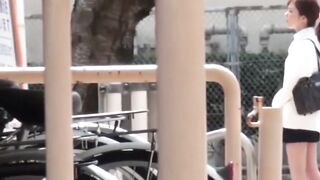 Sexy Asian in knee socks seeks a hidden spot to pee