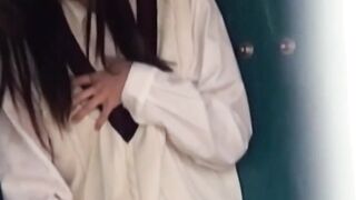 Downpour fails to halt this Asian babe probing vag outdoors