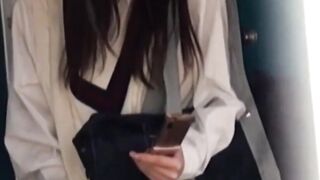 Downpour fails to halt this Asian babe probing vag outdoors