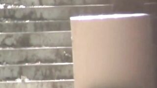 Voyeur spots babe peeing on stairs and flees in wet skirt