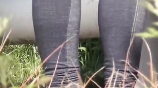 Restrained Asian girl peeing in pants unable to undress