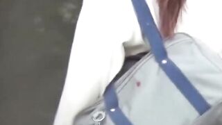 Japanese schoolgirl caught peeing in public by voyeur