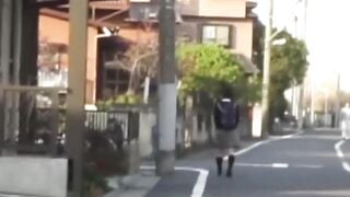 Japanese schoolgirl caught peeing in public by voyeur