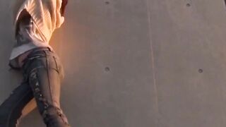 Restrained Asian babes peeing down pant legs