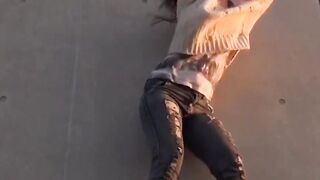 Restrained Asian babes peeing down pant legs