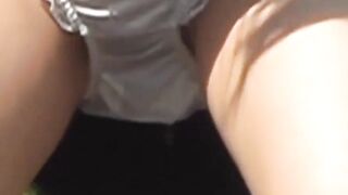 Suited student teases under the skirt and wets panties pee
