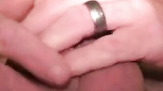 Mature tattooed man with cock ring strokes cock and cums