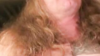 Mature tattooed man with cock ring strokes cock and cums