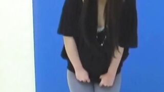 Brunette Japanese teen peeing pants after losing control