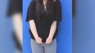 Brunette Japanese teen peeing pants after losing control