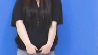 Brunette Japanese teen peeing pants after losing control