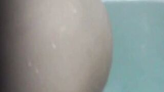 Japanese beauty relaxes in bathtub caught on hidden camera