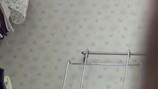 Voyeur captures Japanese girl in a heated moment at home