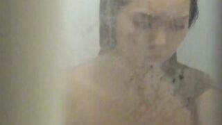 Voyeur captures Japanese girl in a heated moment at home