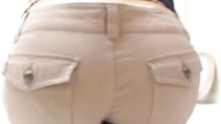 Kinky Asian brunette soaking clothes during photoshoot
