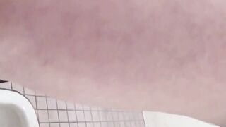 Hidden cam records Japanese women pissing in a restroom