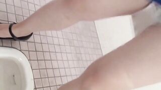 Hidden cam records Japanese women pissing in a restroom