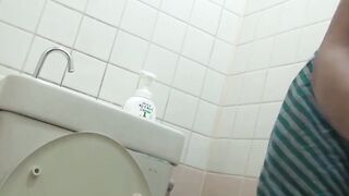 Spy cam films cutie fingering tight pussy in public bathroom