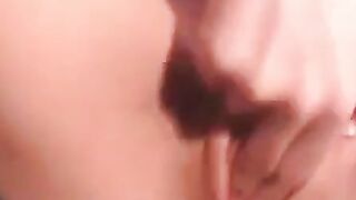 Amateur Girl with Puffy Lips Plays with Dildo on Webcam