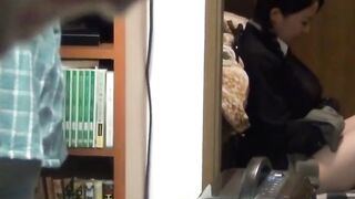 Japanese couple shares an intimate moment while watched
