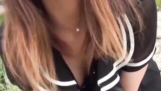 Lustful Japanese girl rubs her pussy around the park